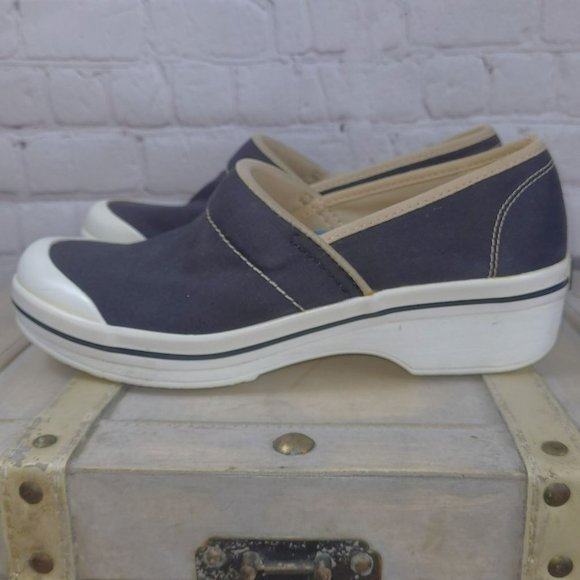 dansko vegan canvas clogs